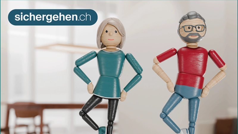 Ein Mann und zwei Frauen beim Turnen.