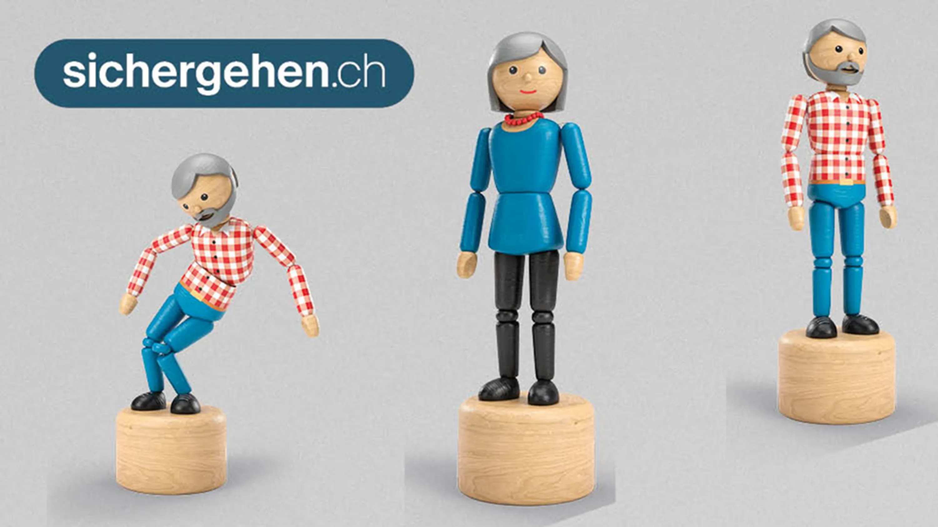 Ein Mann und zwei Frauen beim Turnen.